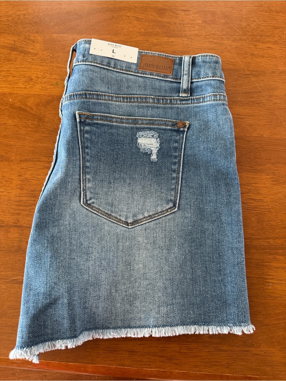 Judy Blue Light Blue Distressed Denim Shorts with Frayed Hem